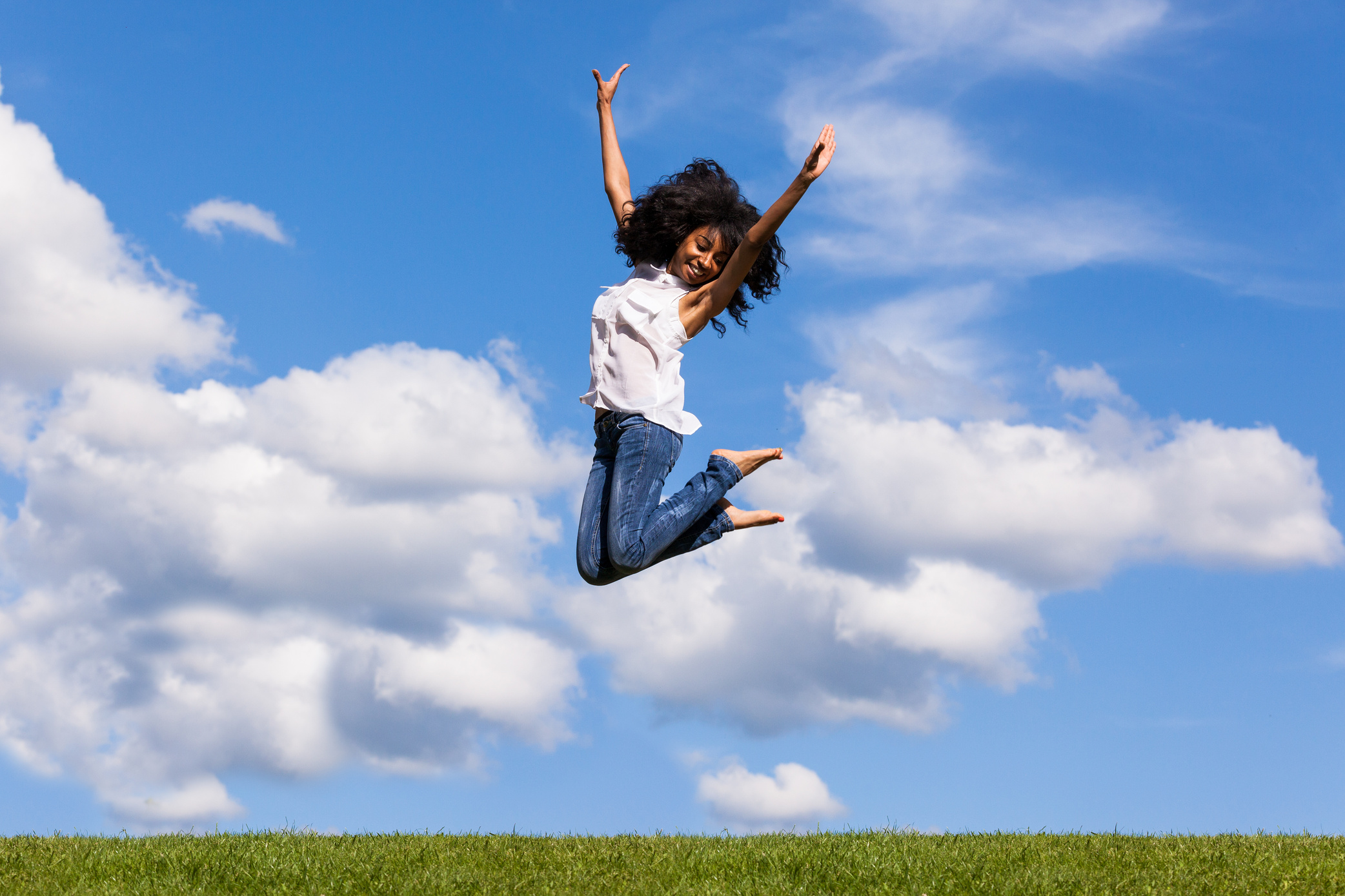 Teenage Black Girl Jumping 